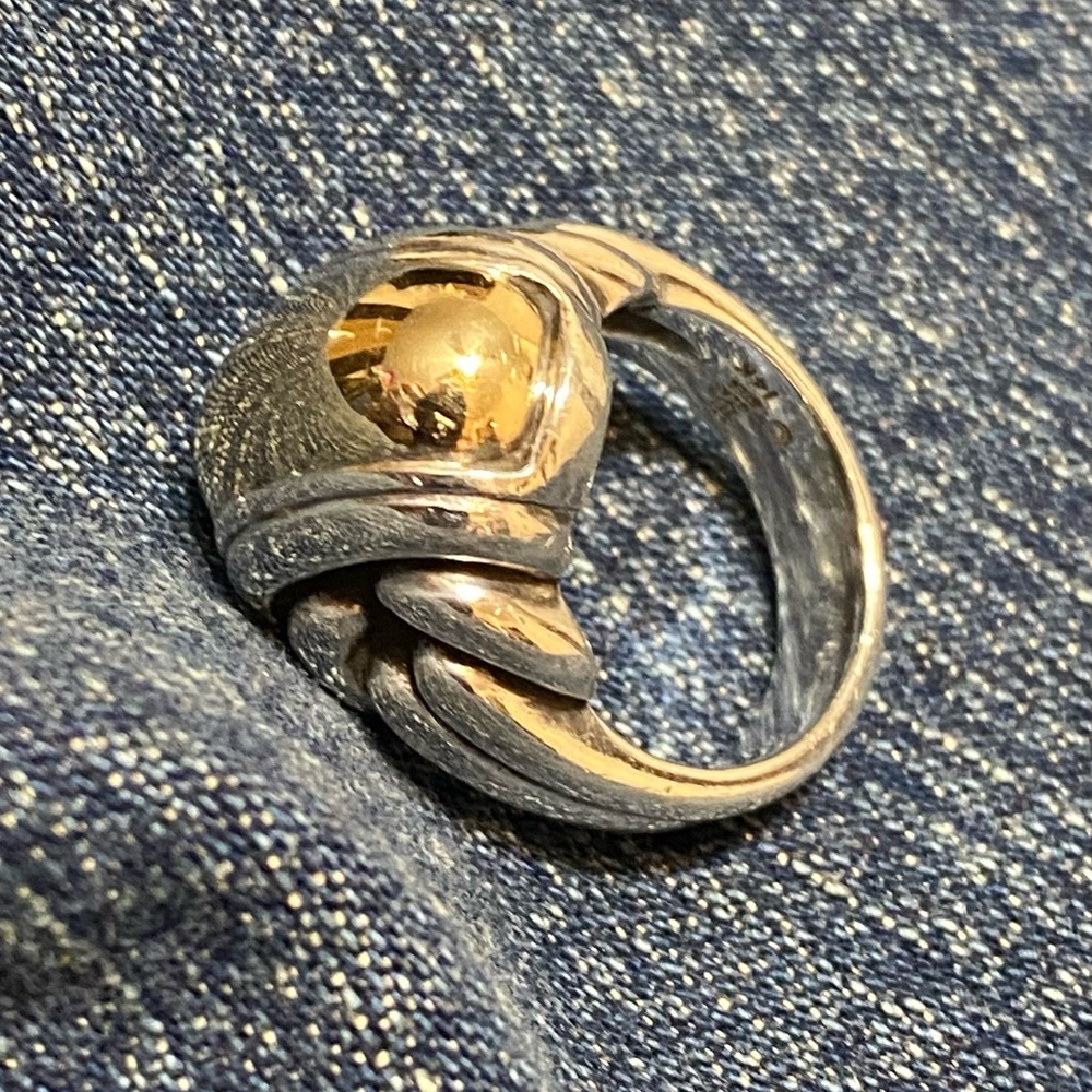 Retired large knot dome ring gold and silver
Sz 7. Has a good stamp - Picture 2 of 8